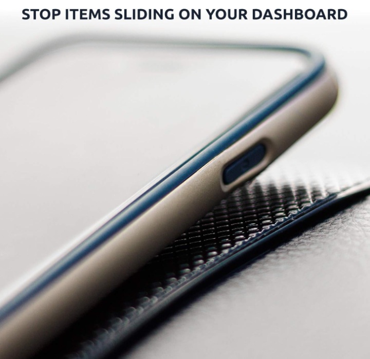 Phone secured on anti-slip dashboard pad.